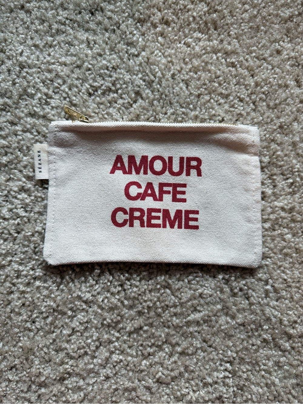 Sézane “Amour Cafe Creme” Cream Canvas Makeup Pouch with Burgundy Print